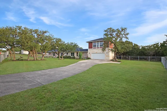 a view of a house with a big yard