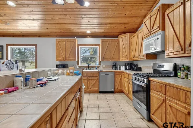 a bedroom with a bed and a walk in closet