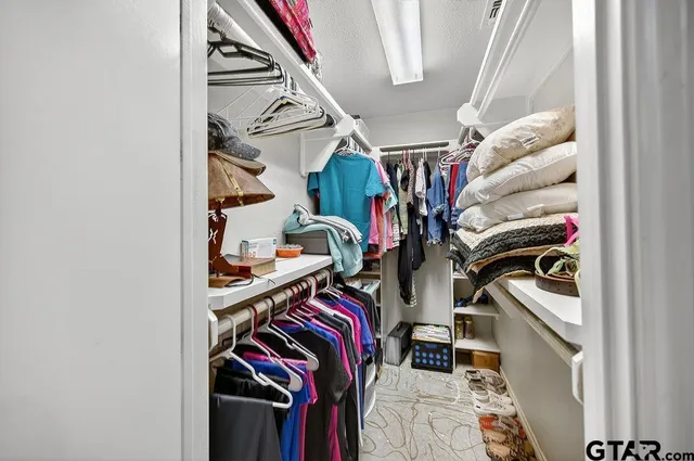 a bathroom with a sink a mirror and a bathtub