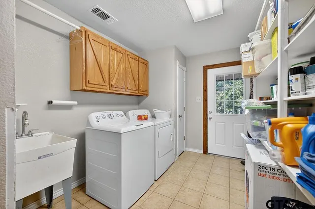 a view of a backyard with a patio