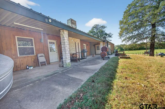 a view of yard with tree s