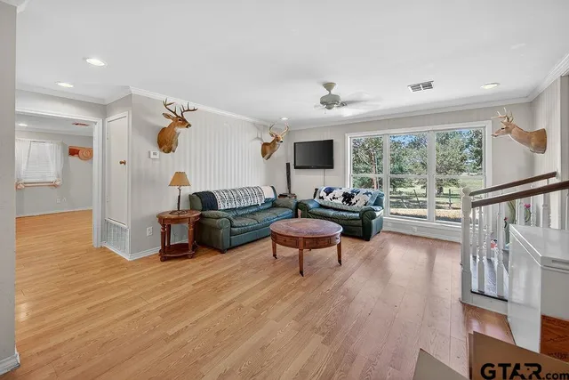 a living room with furniture and a table