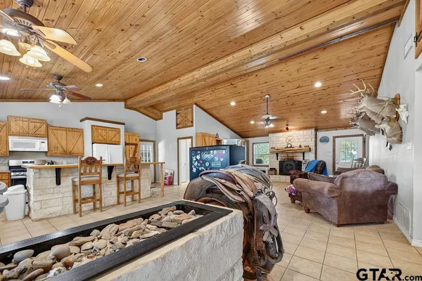 a spacious bathroom with a double vanity sink a mirror and a shower