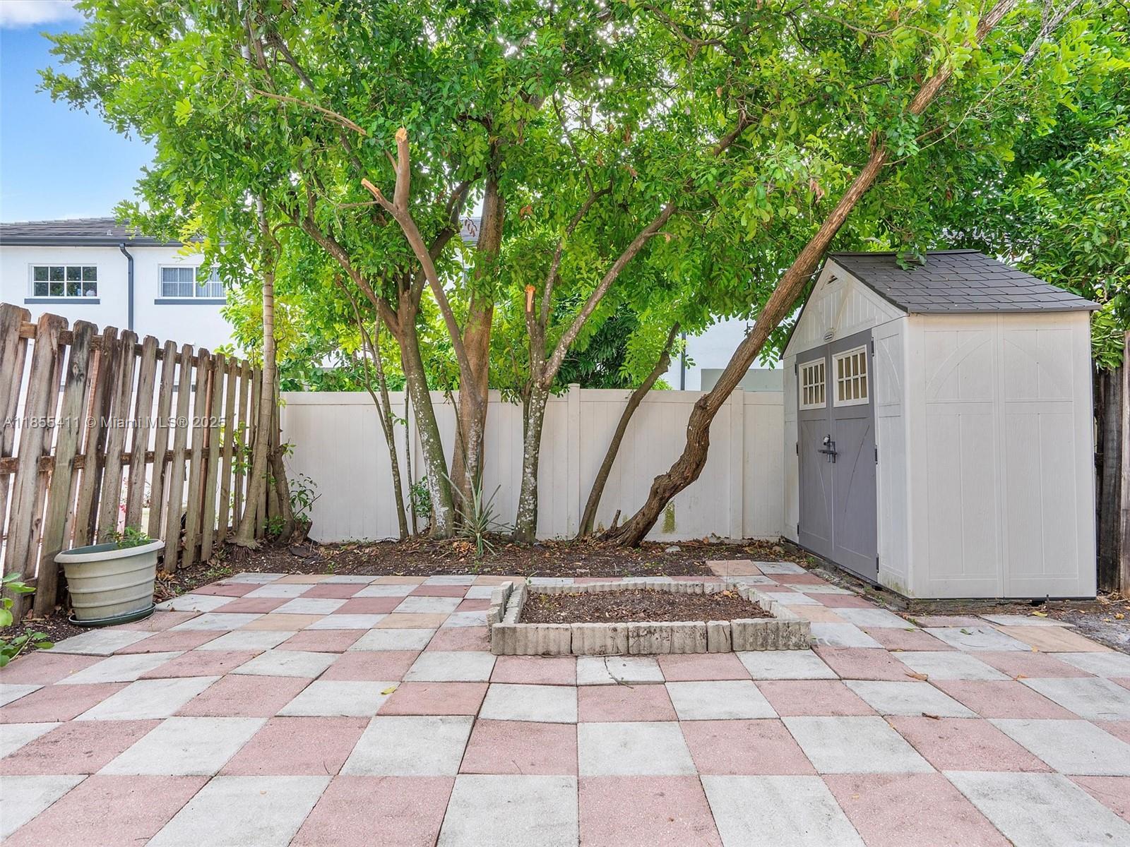 4964 Southwest 128th Avenue Miramar, FL 33027 - Photo 35 of 38 a view of a backyard