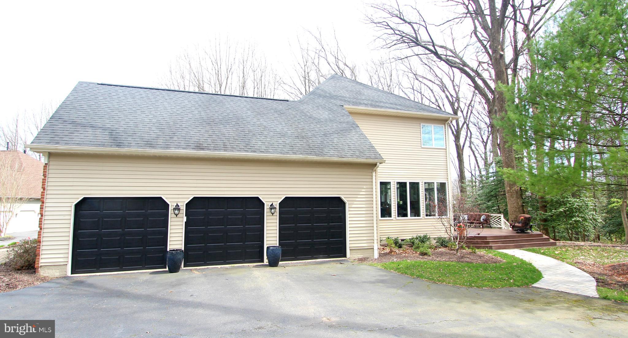 1282 Cobble Pond Way Vienna, VA 22182 - Photo 62 of 76 Three car attached garage with side entry