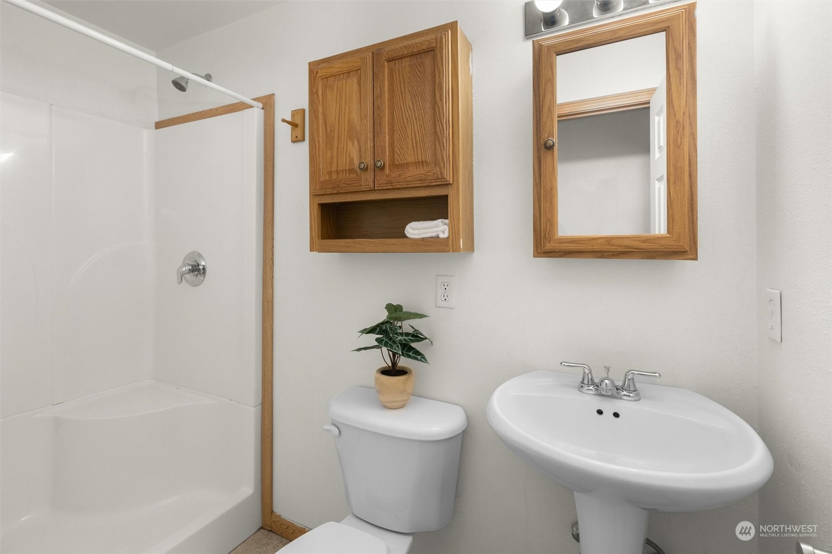 14220 Three Lakes Road Snohomish, WA 98290 - Photo 13 of 31 a bathroom with a sink toilet and shower