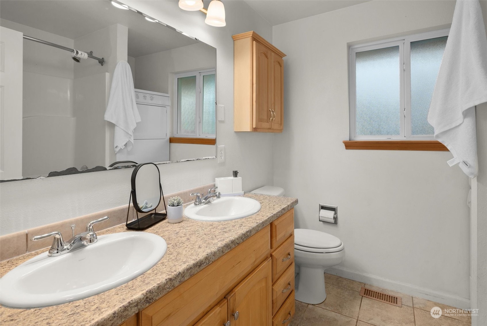 14220 Three Lakes Road Snohomish, WA 98290 - Photo 16 of 31 a bathroom with a granite countertop sink mirror vanity and toilet