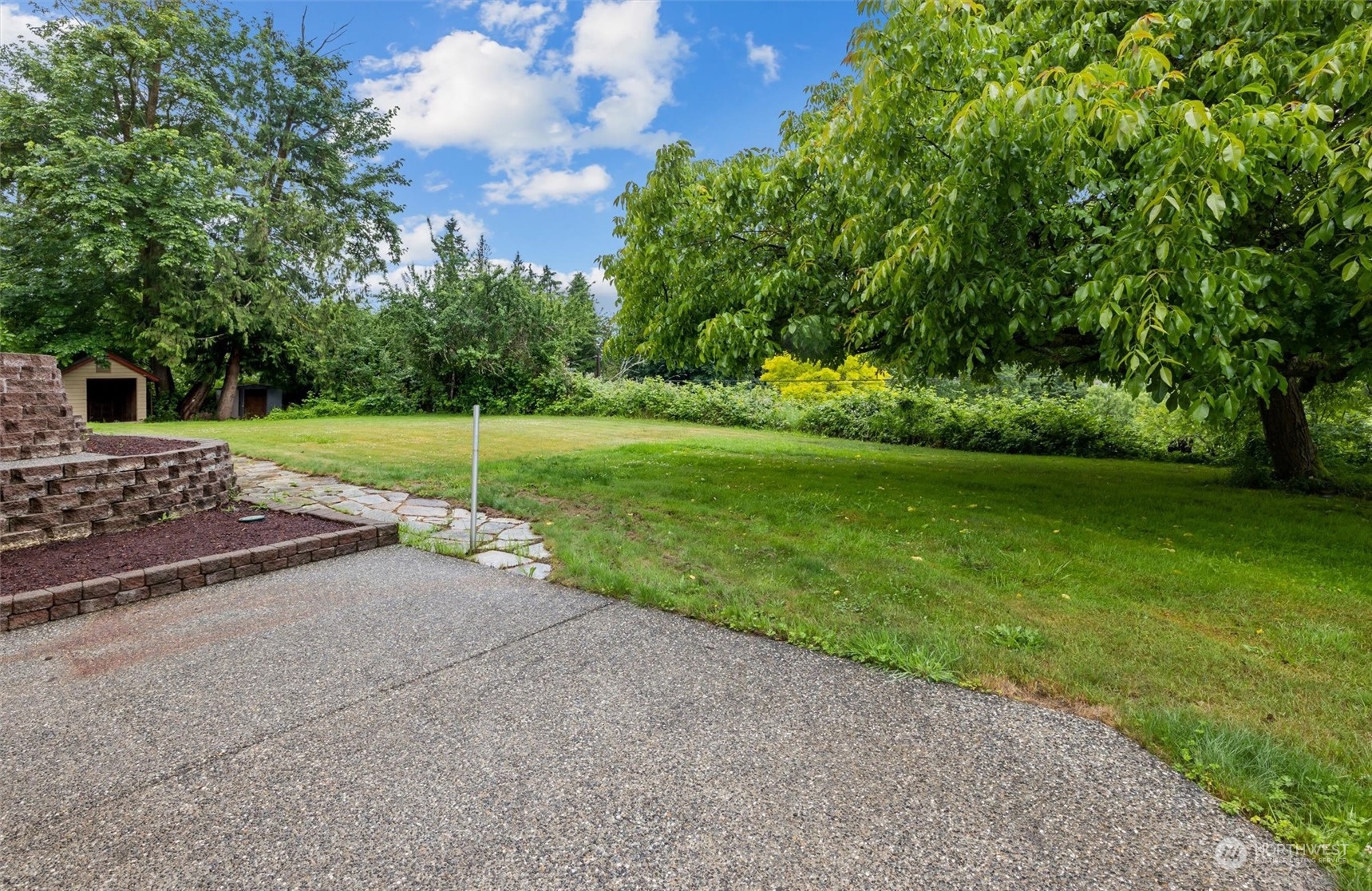 14220 Three Lakes Road Snohomish, WA 98290 - Photo 20 of 31 a view of a backyard of the house