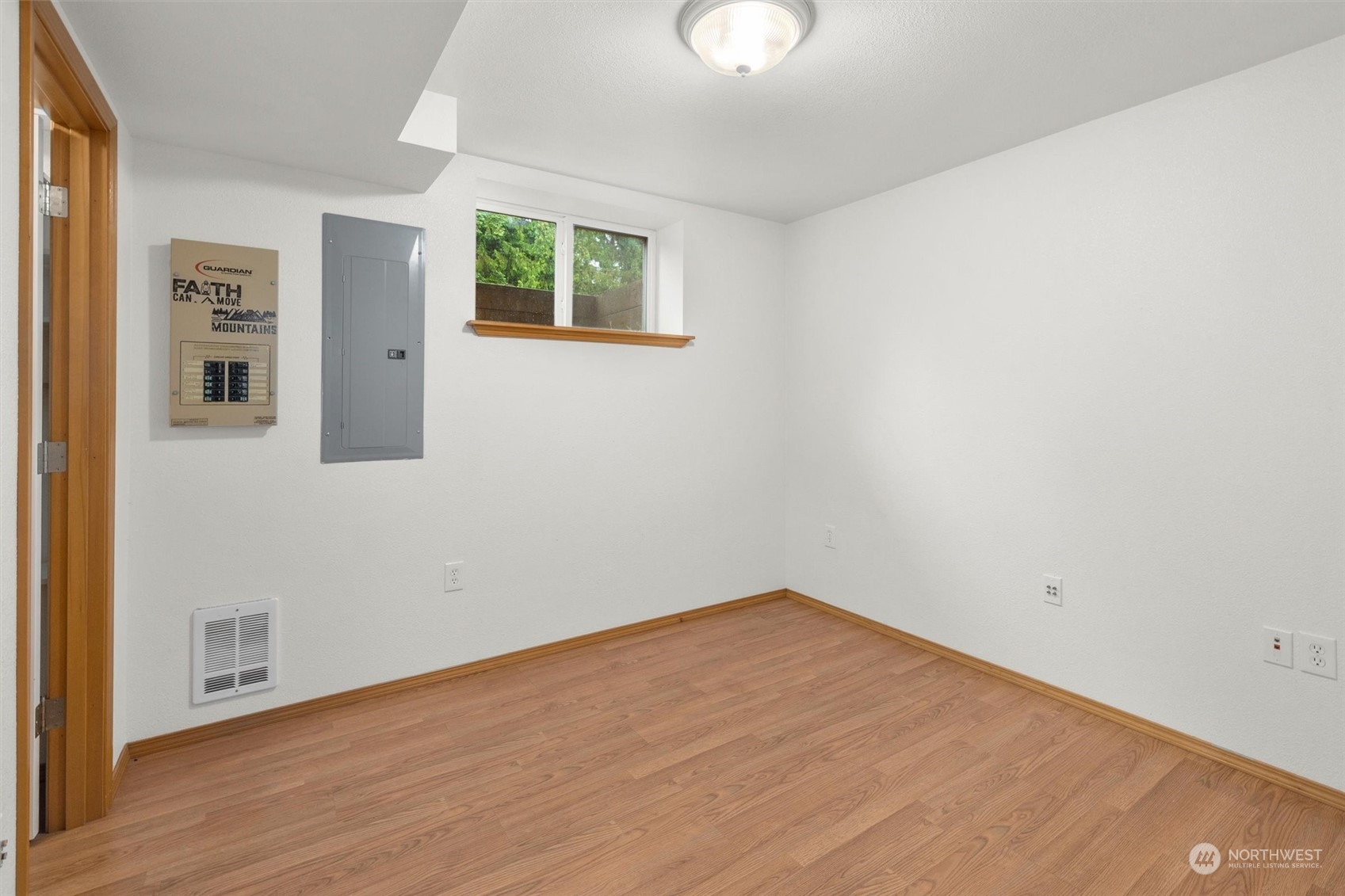 14220 Three Lakes Road Snohomish, WA 98290 - Photo 24 of 31 wooden floor in an empty room with a window