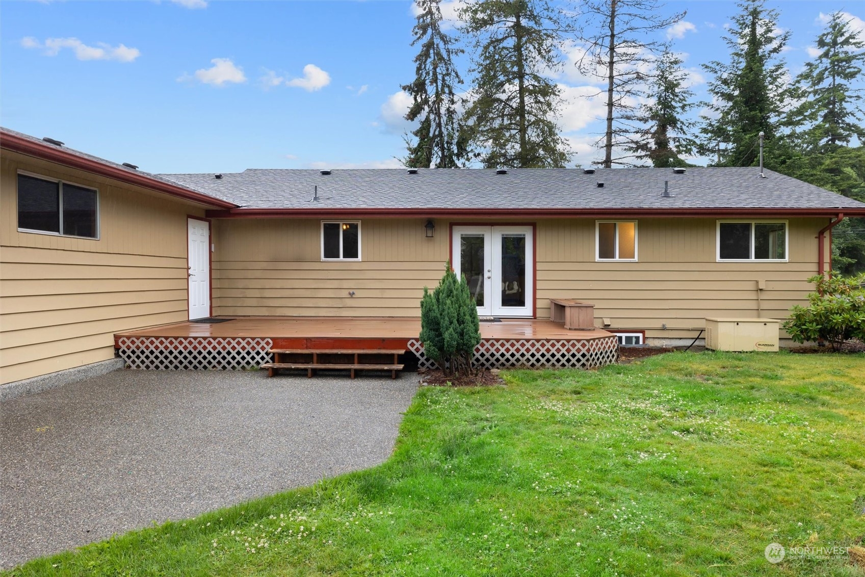 14220 Three Lakes Road Snohomish, WA 98290 - Photo 28 of 31 a front view of a house with a garden