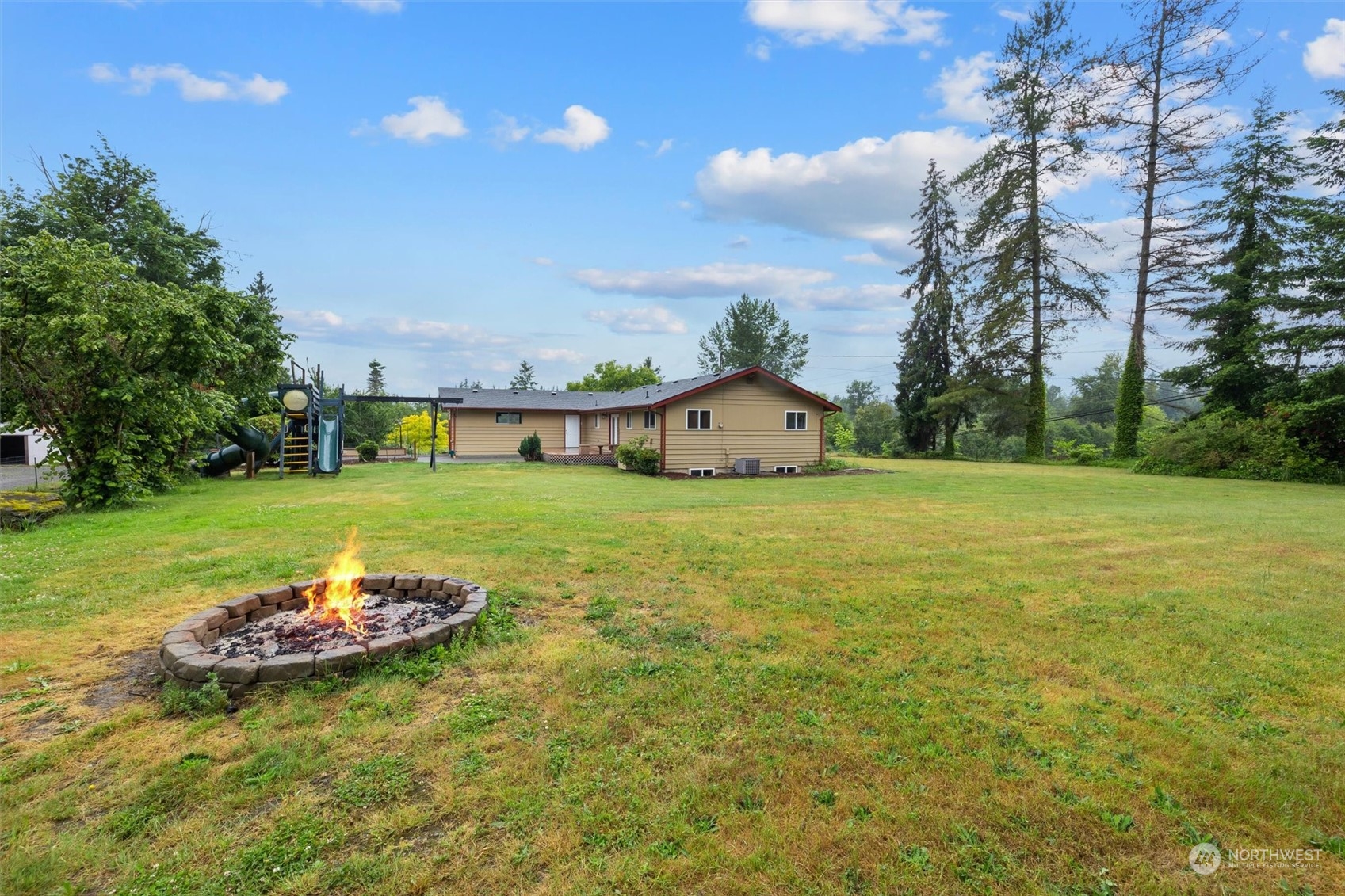 14220 Three Lakes Road Snohomish, WA 98290 - Photo 31 of 31 a view of a house with a yard