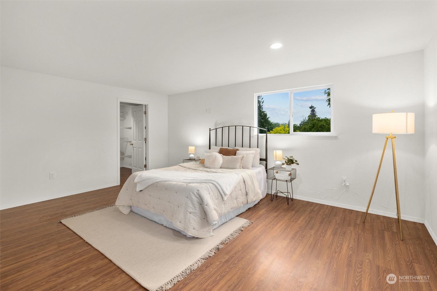 14220 Three Lakes Road Snohomish, WA 98290 - Photo 10 of 31 a bedroom with a bed and a painting on the wall