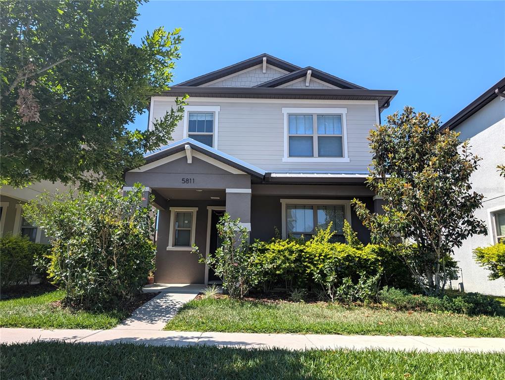 5811 Colony Glen Road Lithia, FL 33547 - Photo 1 of 1 a front view of a house with a yard and garage