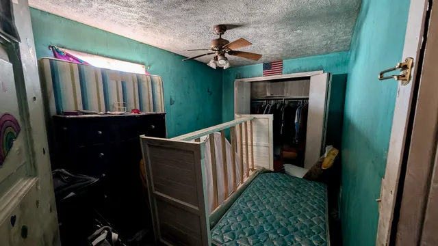 a bathroom with a tub and shower