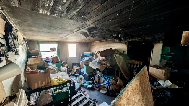 a view of gym equipment with wooden floor
