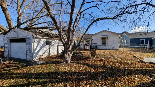 a front view of house with a yard