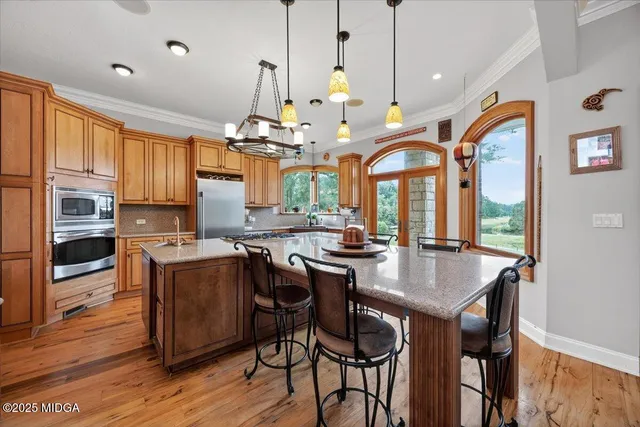 a bathroom with a sink a mirror and a bathtub