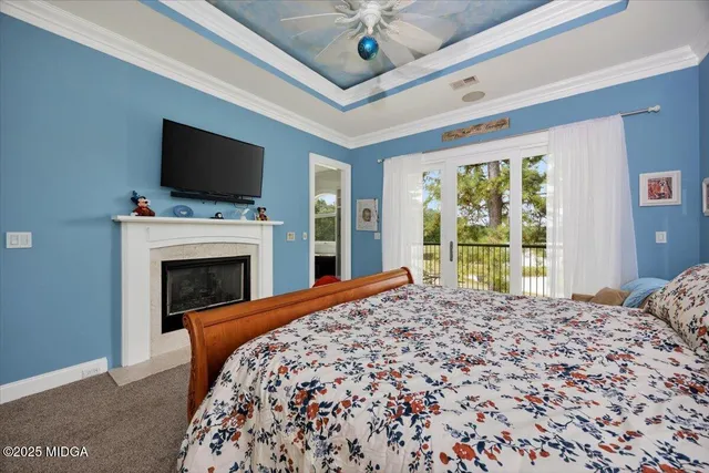 an aerial view of a residential houses with outdoor space