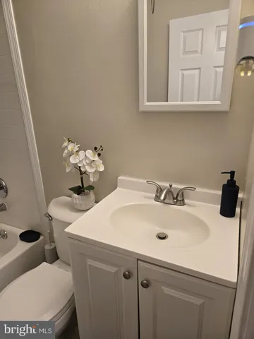 a bathroom with a sink and a toilet
