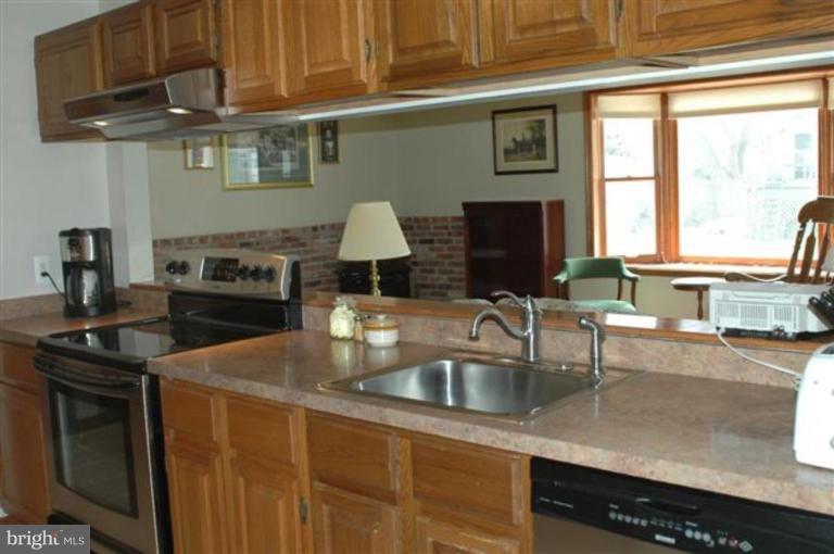 335 Virginia Road Stevensville, MD 21666 - Photo 18 of 21 Kitchen/Living Room
