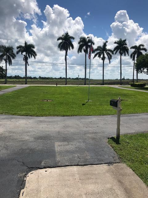 977 Bacom Point Road Pahokee, FL 33476 - Photo 16 of 21 Exterior Street View