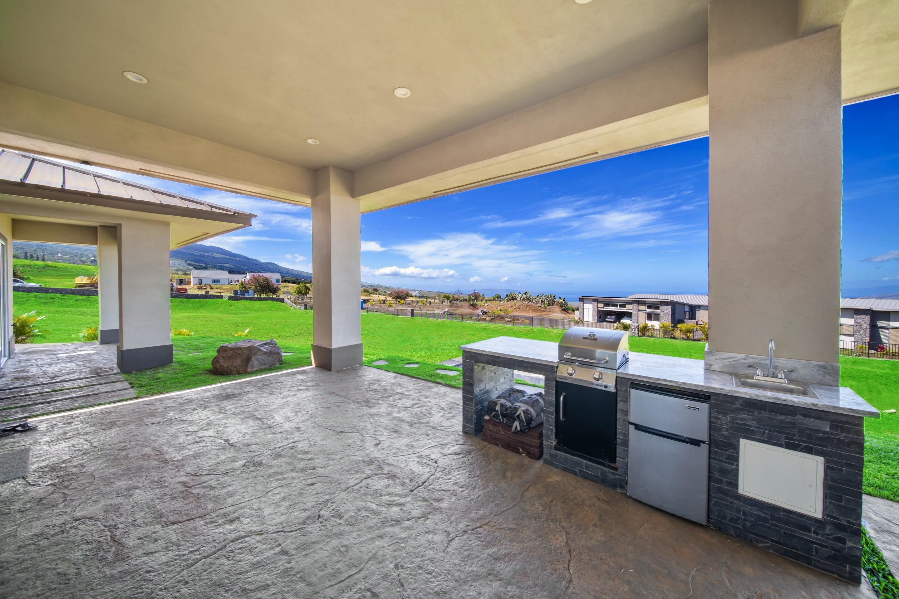 272 Huahua Street Kula, HI 96790 - Photo 30 of 43 a view of an outdoor kitchen and outdoor space