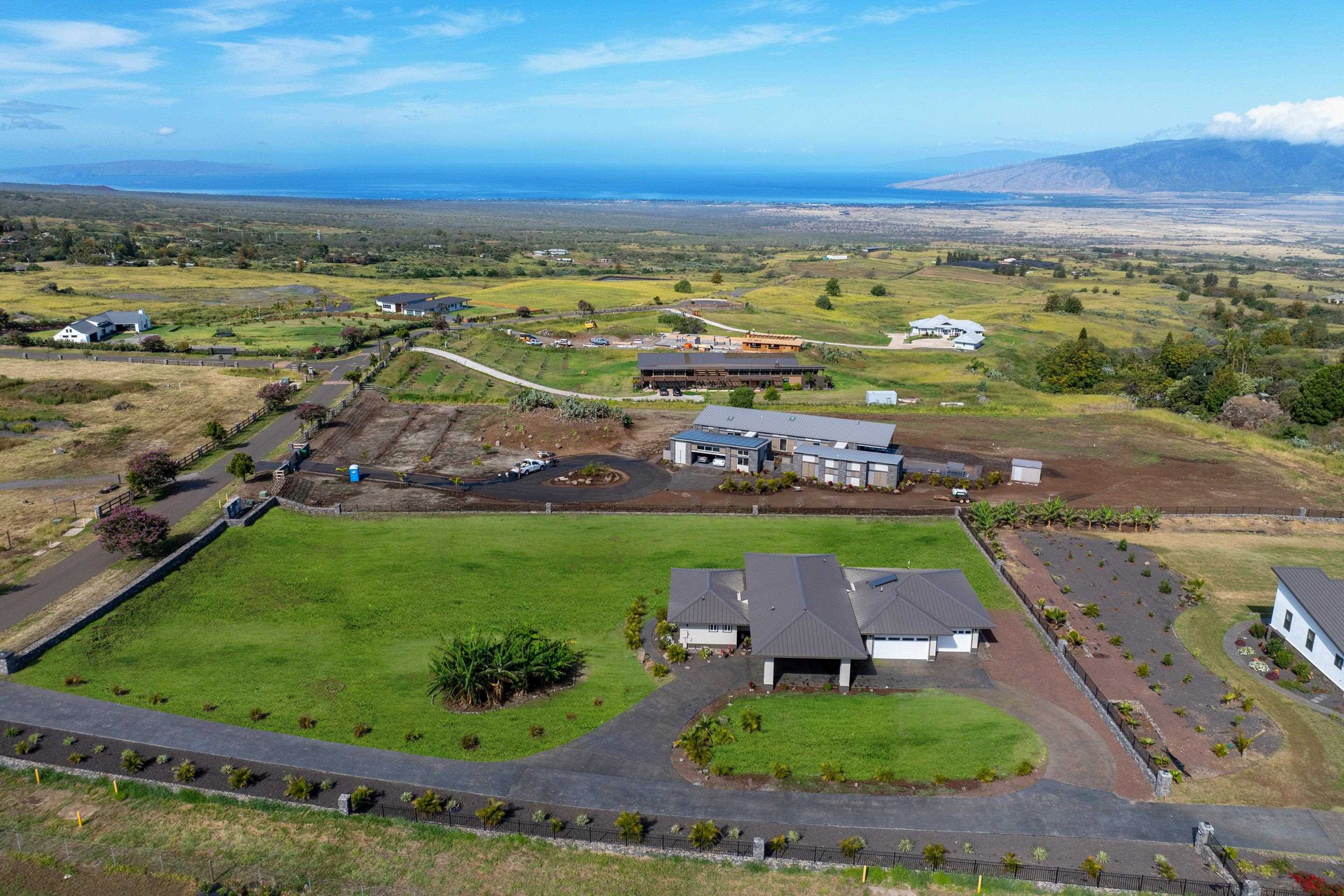 272 Huahua Street Kula, HI 96790 - Photo 42 of 43 an aerial view of a residential houses with outdoor space