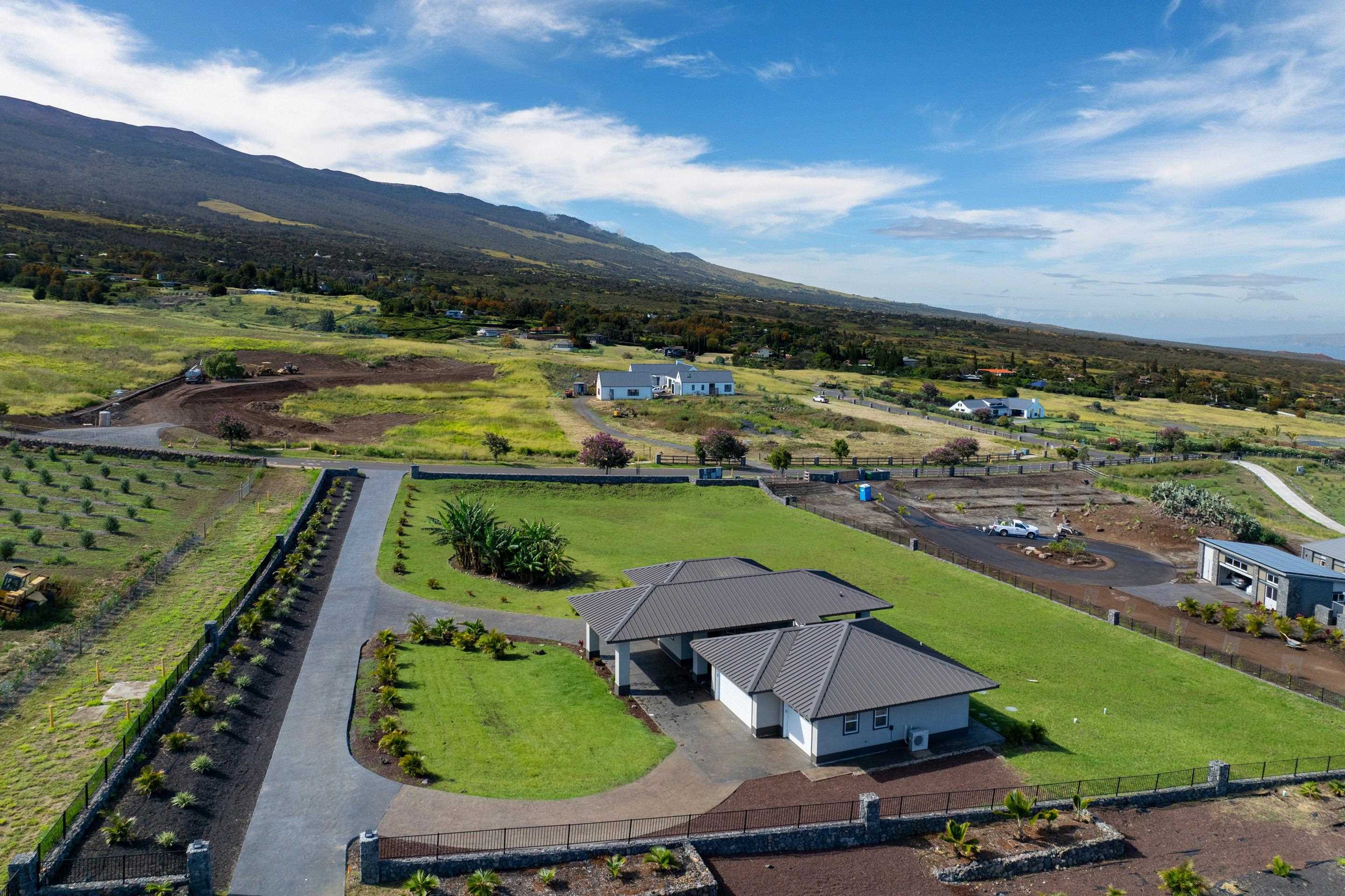 272 Huahua Street Kula, HI 96790 - Photo 6 of 43 an aerial view of a house