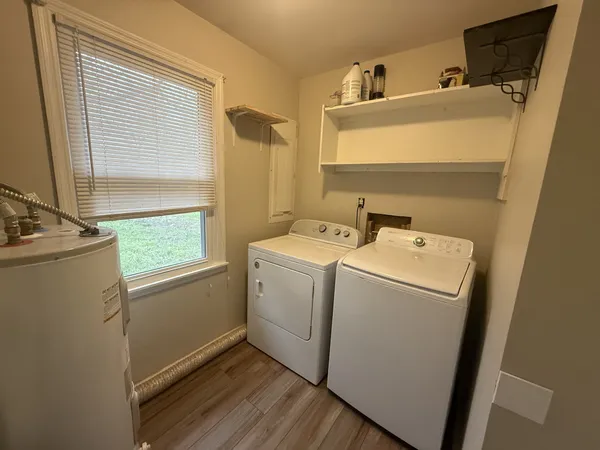 a utility room with dryer and washer