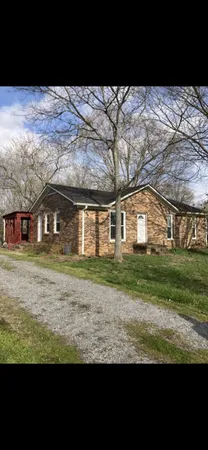 a view front of house with a yard