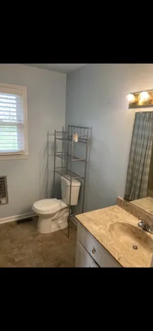 a view of bathroom and sink