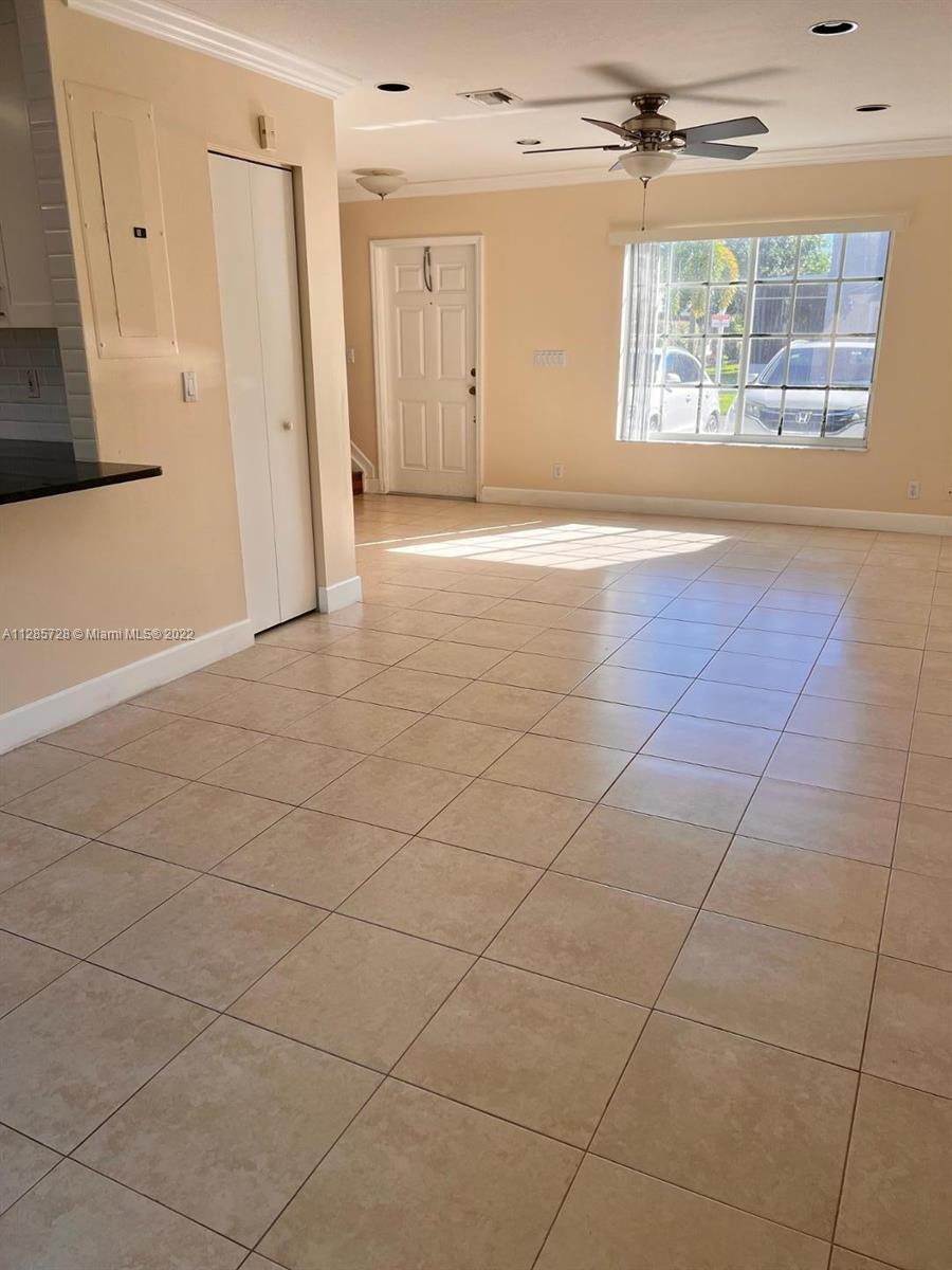 Lakeview Deerfield Beach, FL 33442 - Photo 4 of 14 a view of an empty room with a window