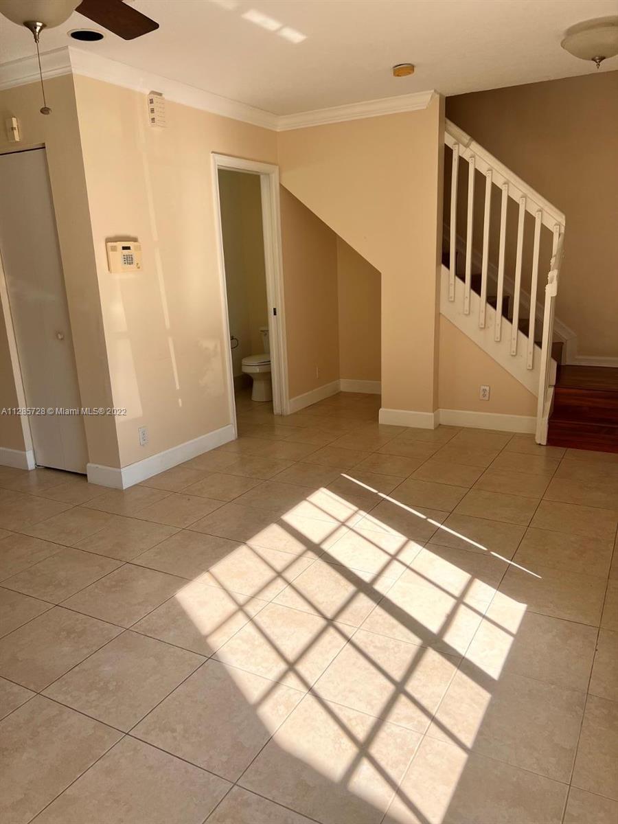 Lakeview Deerfield Beach, FL 33442 - Photo 6 of 14 a view of entryway with stairs
