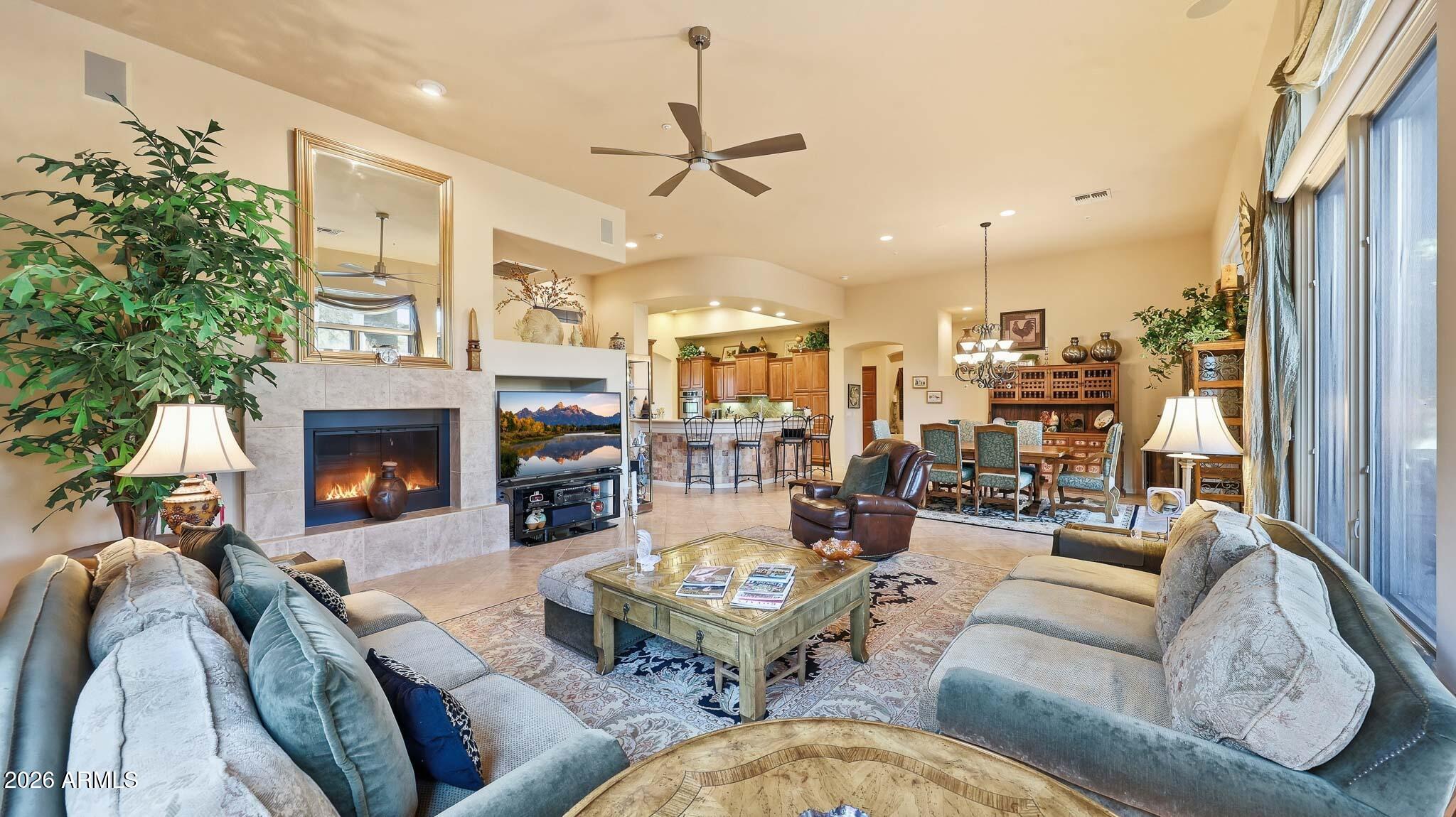 14341 East Geronimo Road Scottsdale, AZ 85259 - Photo 11 of 40 a living room with fireplace furniture and a fireplace