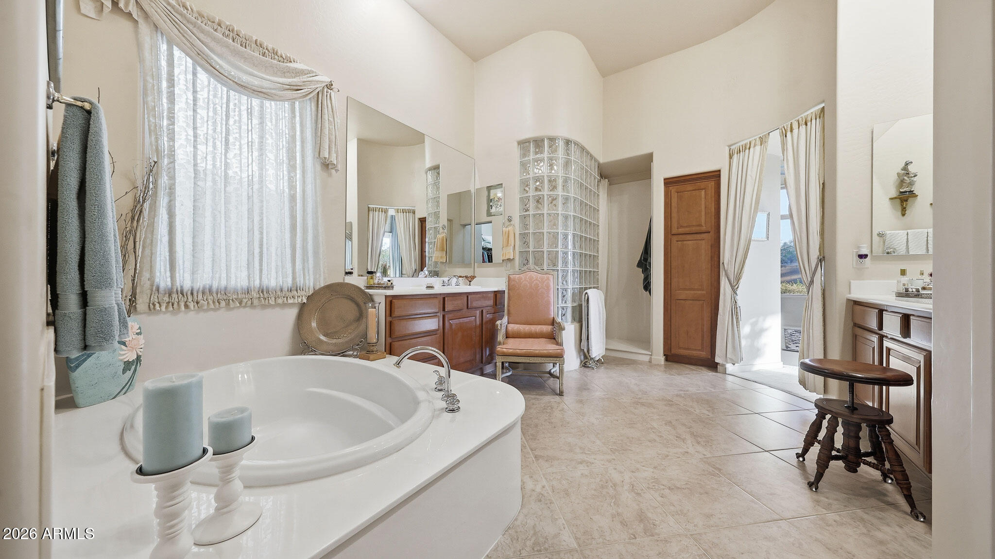 14341 East Geronimo Road Scottsdale, AZ 85259 - Photo 17 of 40 a bath room with a sink and a mirror