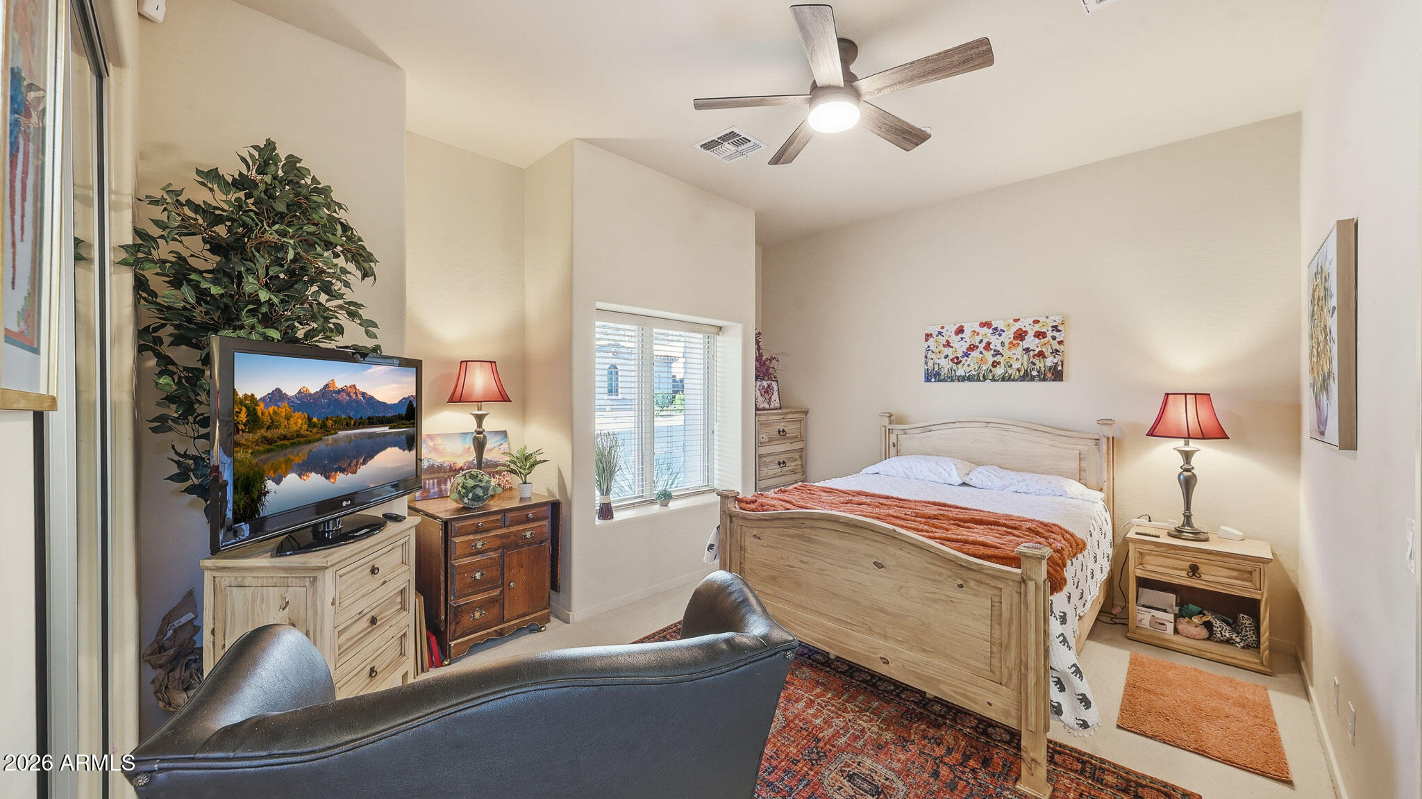 14341 East Geronimo Road Scottsdale, AZ 85259 - Photo 19 of 40 a bedroom with furniture and a flat screen tv