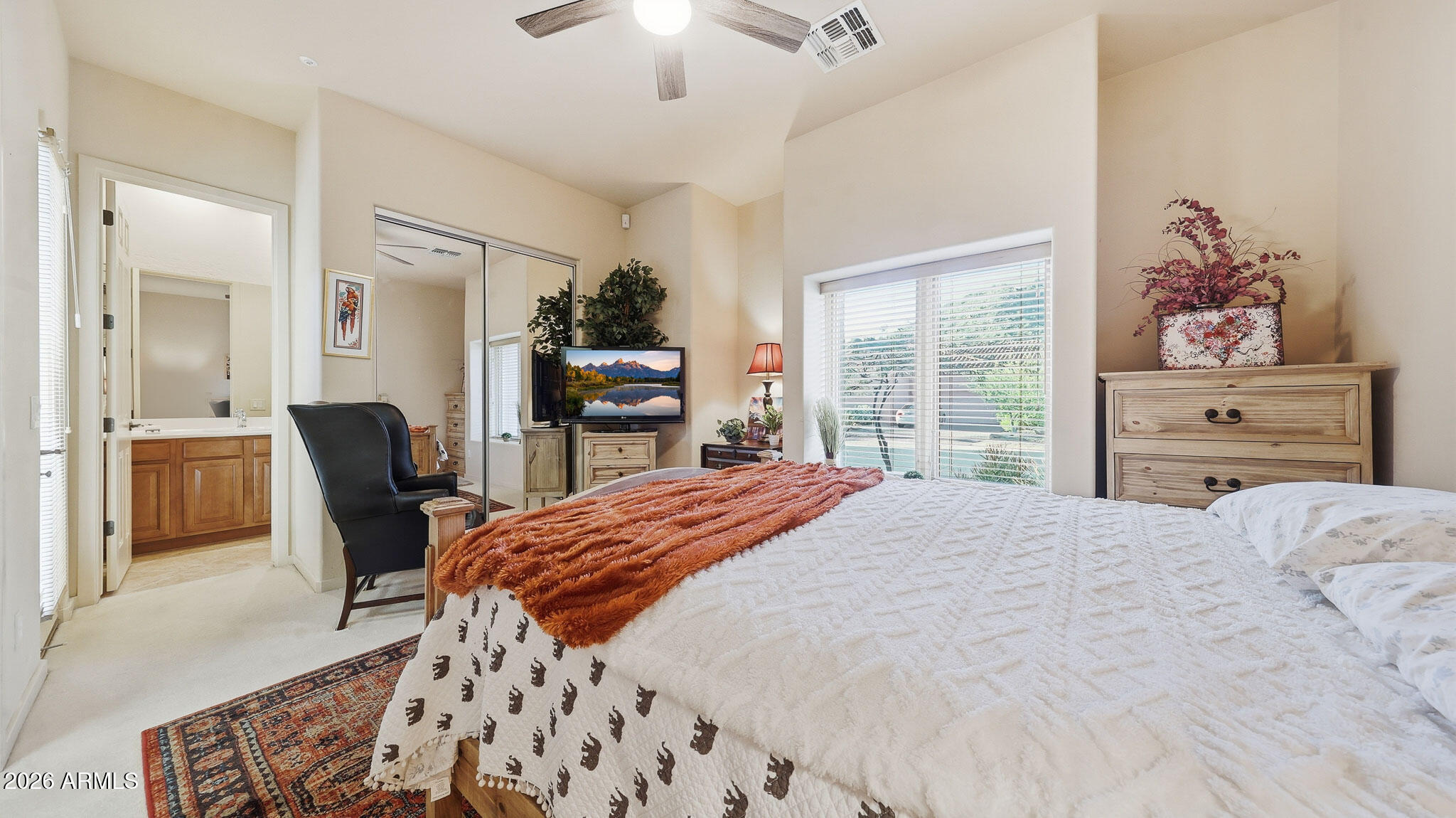 14341 East Geronimo Road Scottsdale, AZ 85259 - Photo 20 of 40 a bedroom with a bed a table and chair