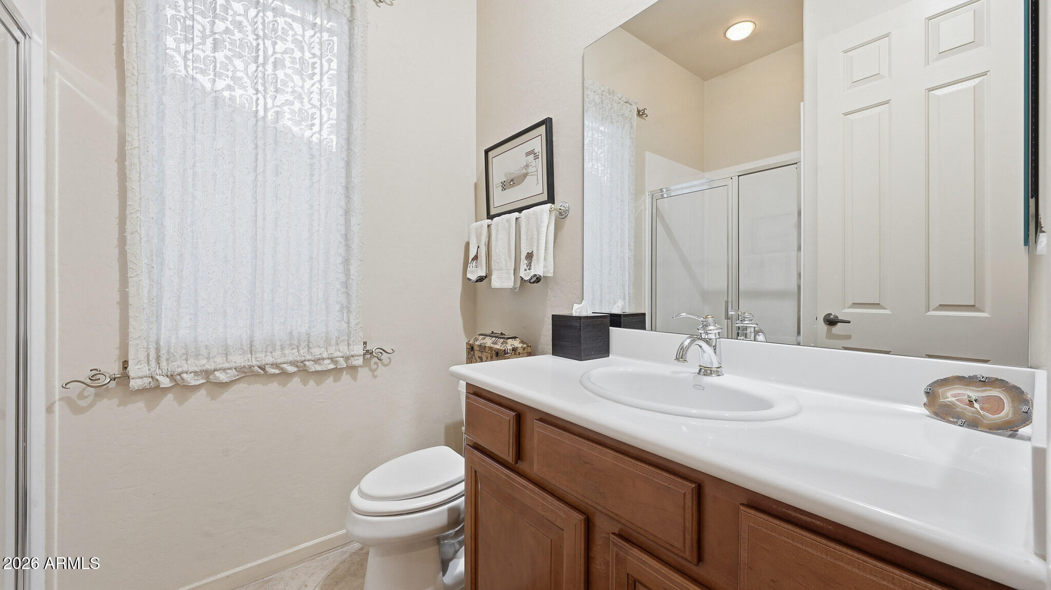 14341 East Geronimo Road Scottsdale, AZ 85259 - Photo 25 of 40 a bathroom with a sink and a toilet