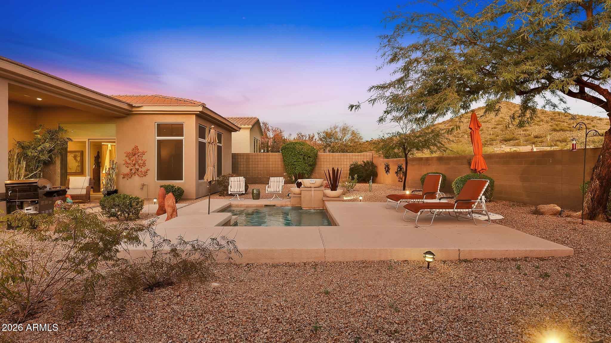 14341 East Geronimo Road Scottsdale, AZ 85259 - Photo 29 of 40 a view of the house with backyard