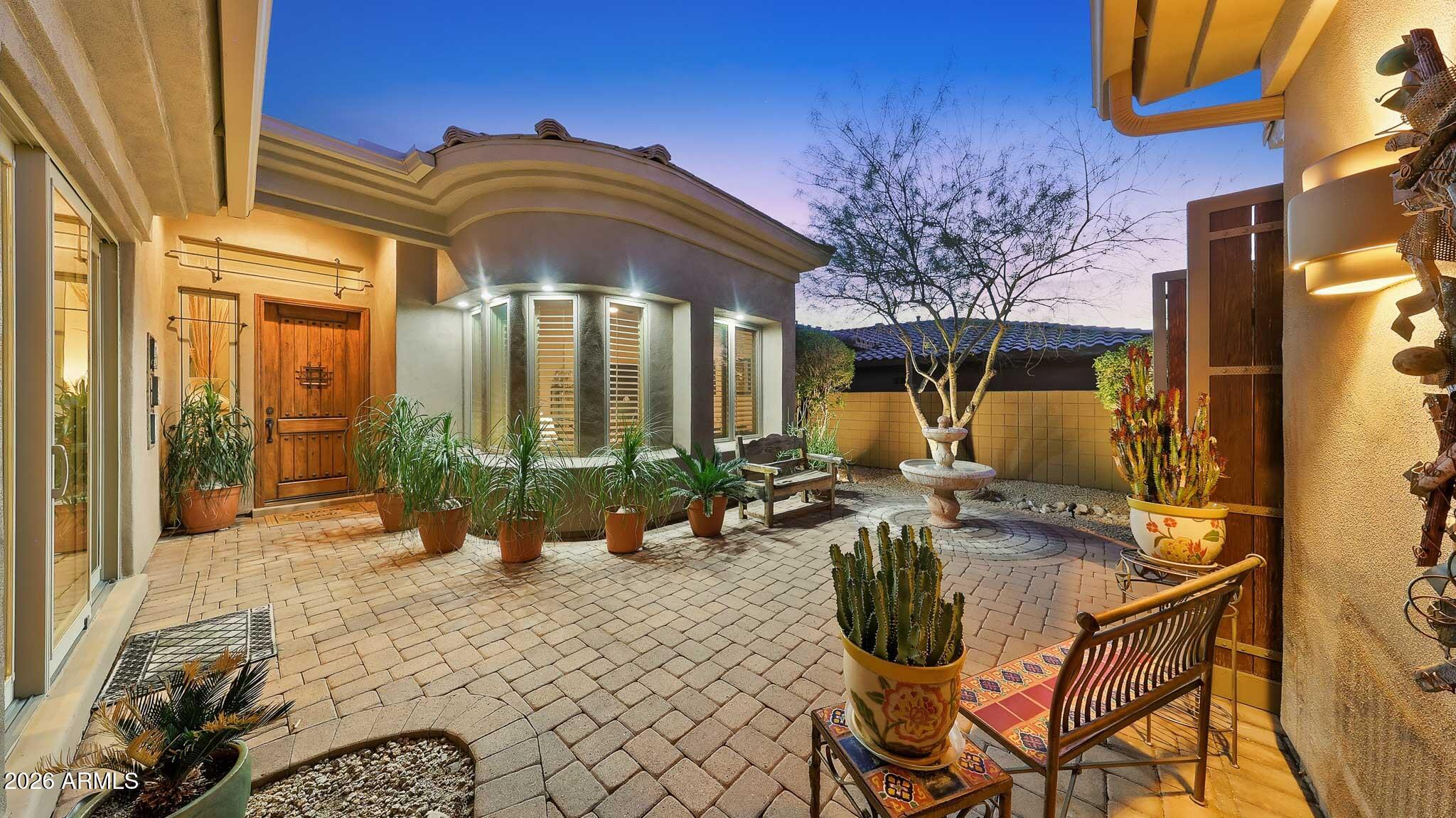 14341 East Geronimo Road Scottsdale, AZ 85259 - Photo 34 of 40 a view of a chairs and table in the patio