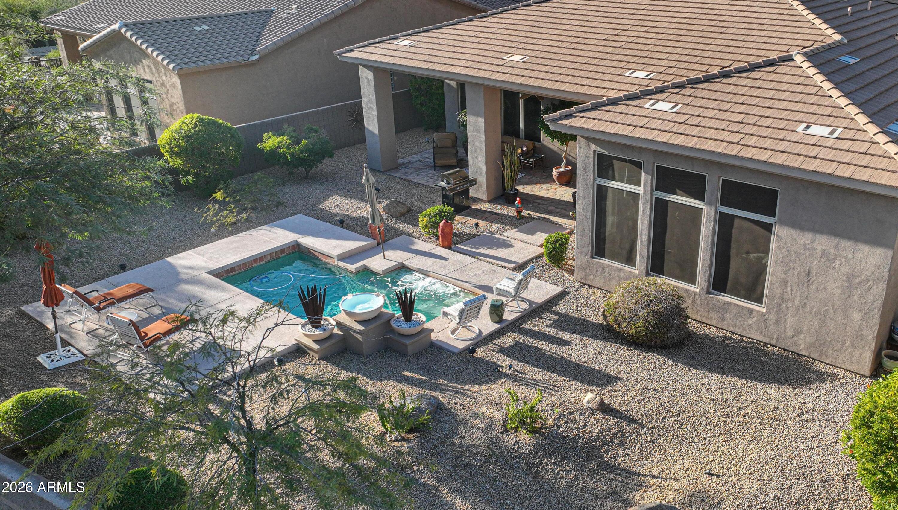 14341 East Geronimo Road Scottsdale, AZ 85259 - Photo 36 of 40 a front view of house with yard outdoor seating and green space