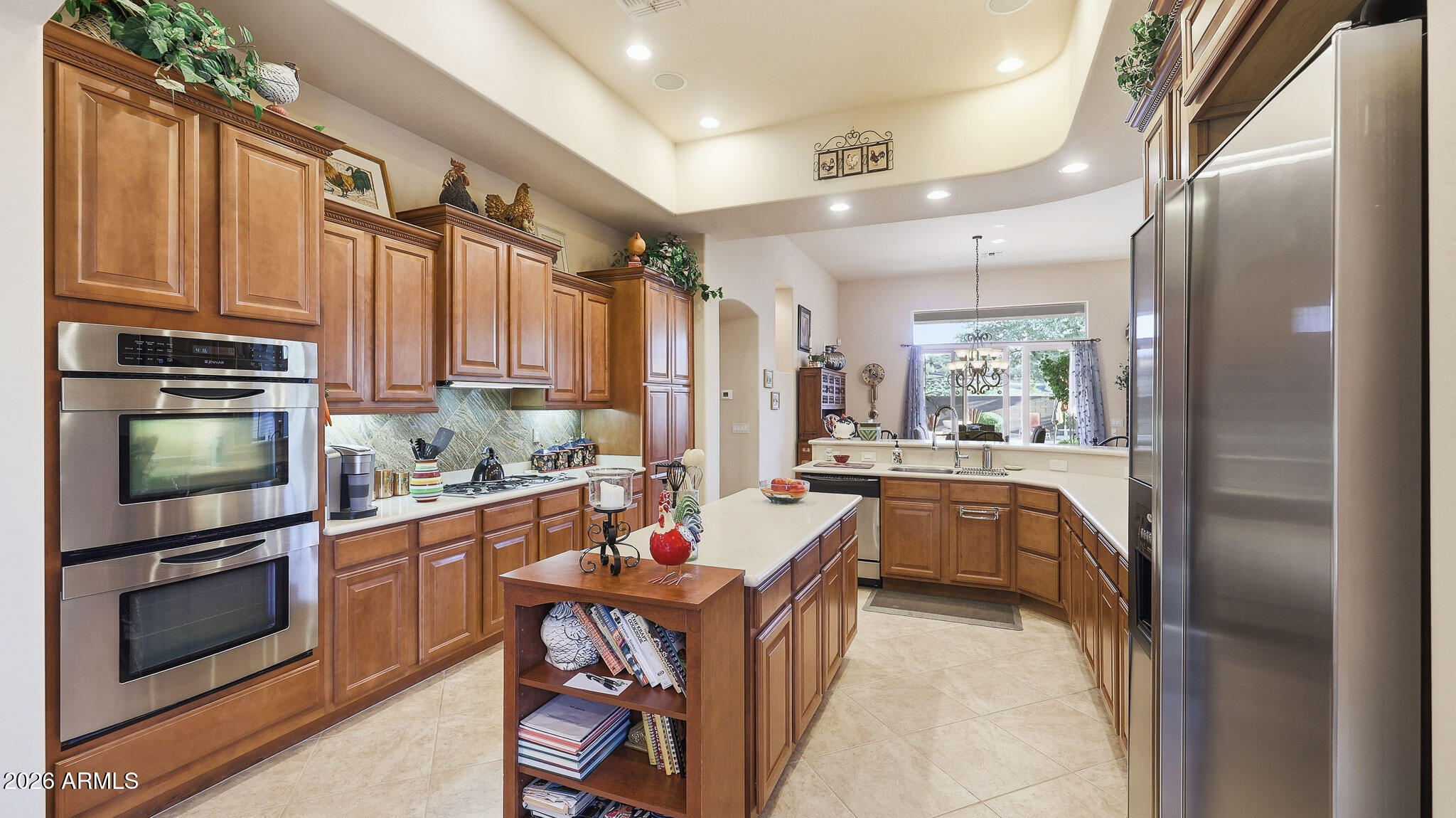 14341 East Geronimo Road Scottsdale, AZ 85259 - Photo 5 of 40 a kitchen with refrigerator cabinets and furniture