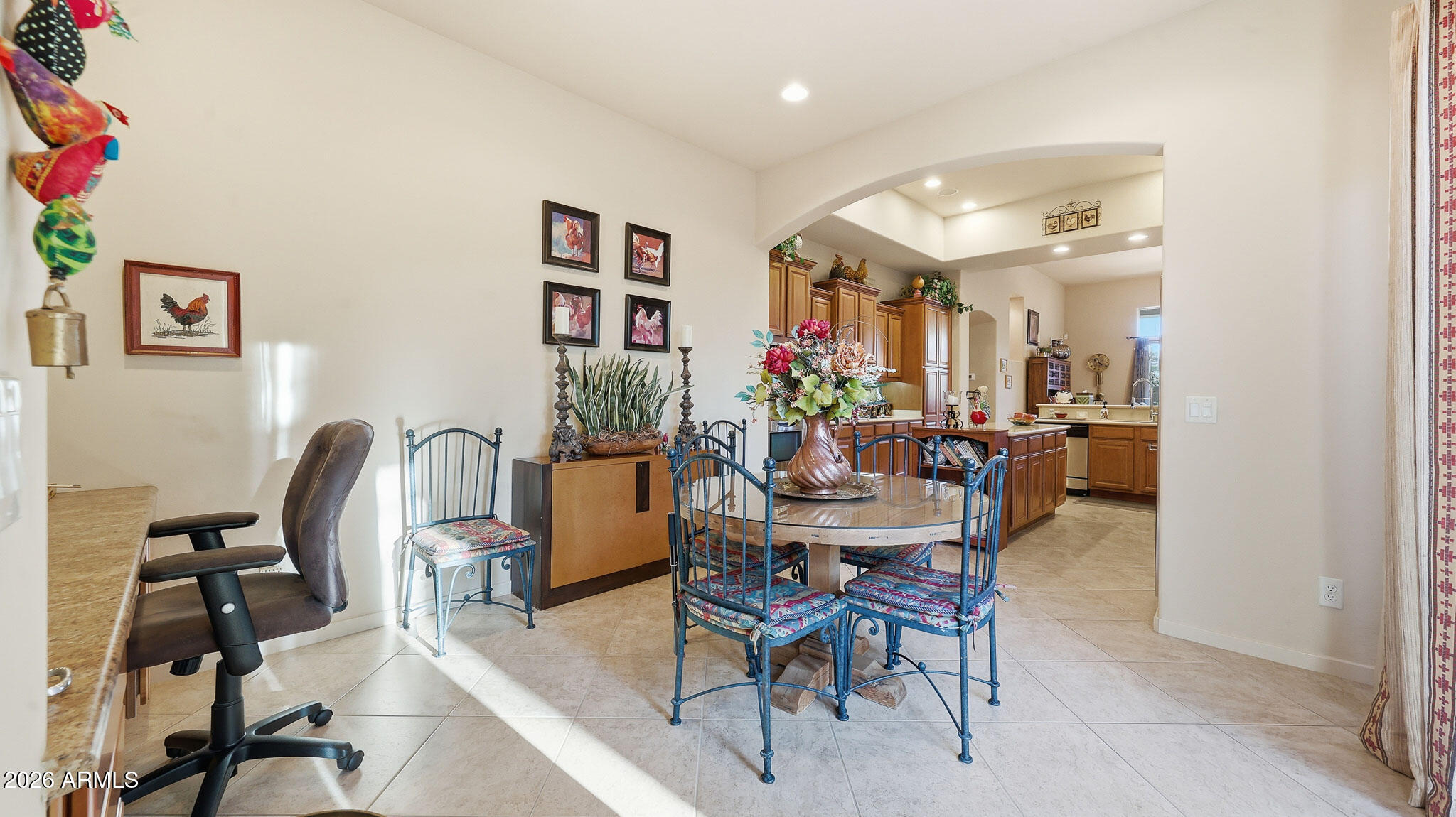 14341 East Geronimo Road Scottsdale, AZ 85259 - Photo 8 of 40 a view of a dining room with furniture and a potted plant