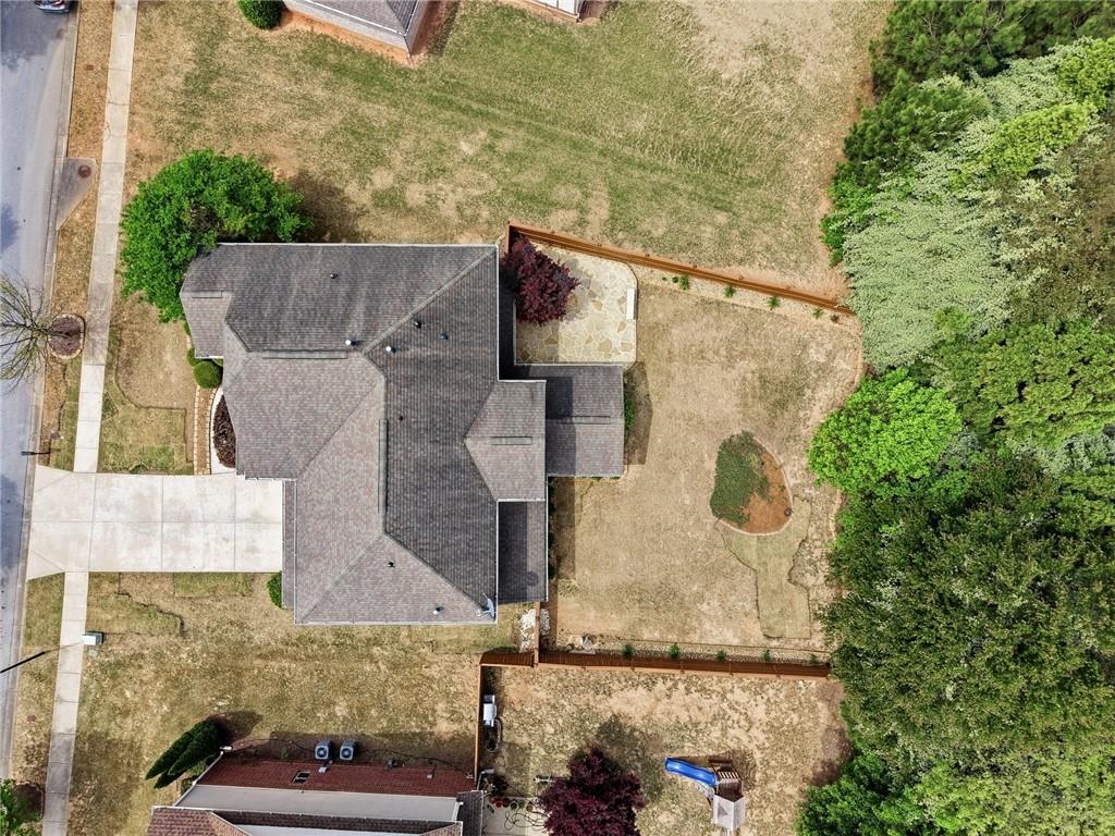 3770 Terrasol Trail Southwest Lilburn, GA 30047 - Photo 44 of 63 an aerial view of residential houses with outdoor space