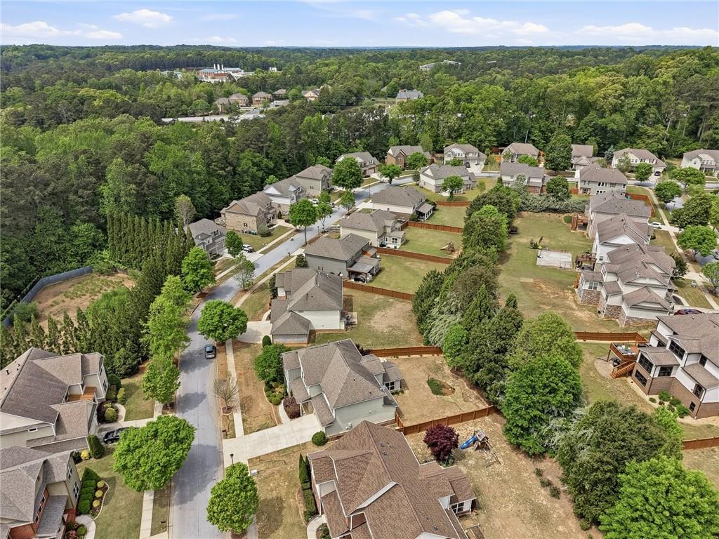 3770 Terrasol Trail Southwest Lilburn, GA 30047 - Photo 45 of 63 an aerial view of residential houses with outdoor space