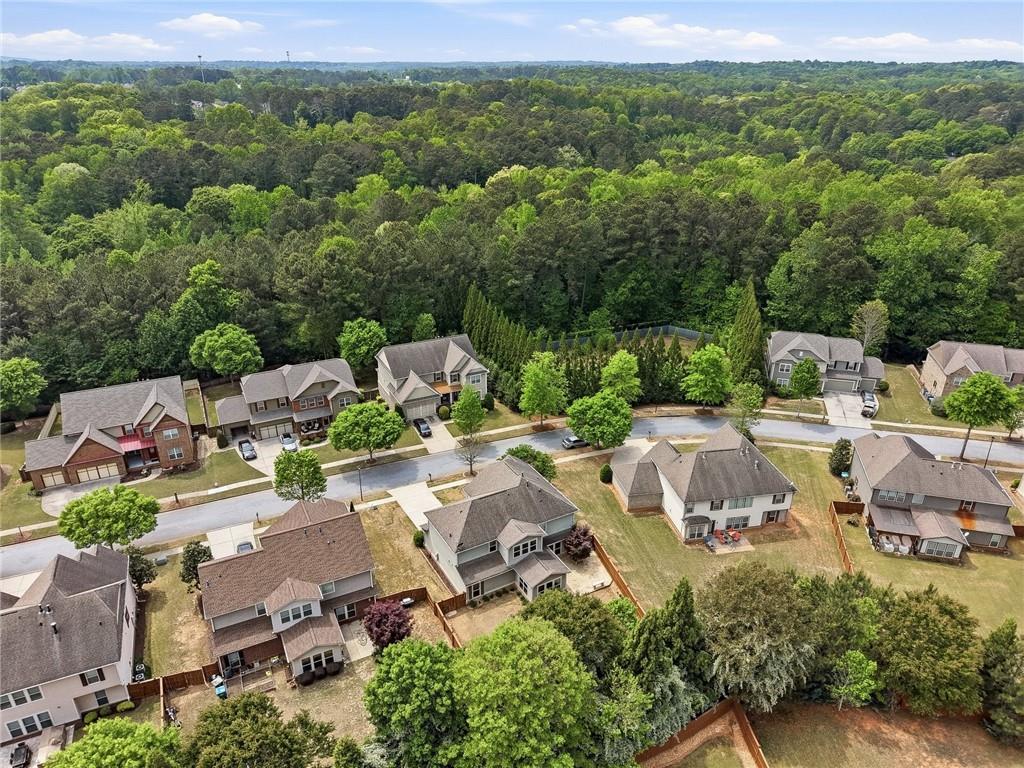 3770 Terrasol Trail Southwest Lilburn, GA 30047 - Photo 46 of 63 an aerial view of a city with lots of residential buildings