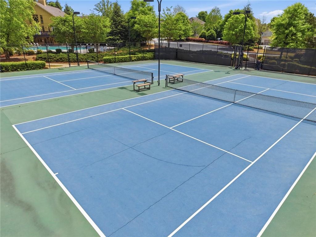 3770 Terrasol Trail Southwest Lilburn, GA 30047 - Photo 53 of 63 a view of a tennis court