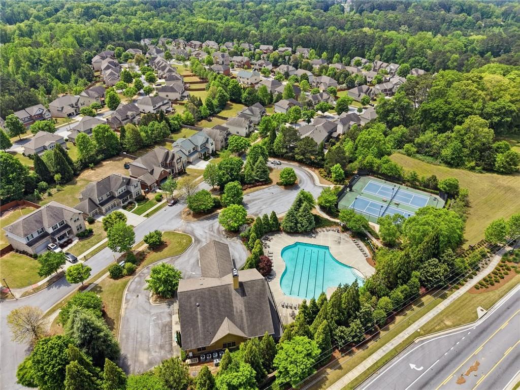 3770 Terrasol Trail Southwest Lilburn, GA 30047 - Photo 59 of 63 an aerial view of residential house with outdoor space and trees all around