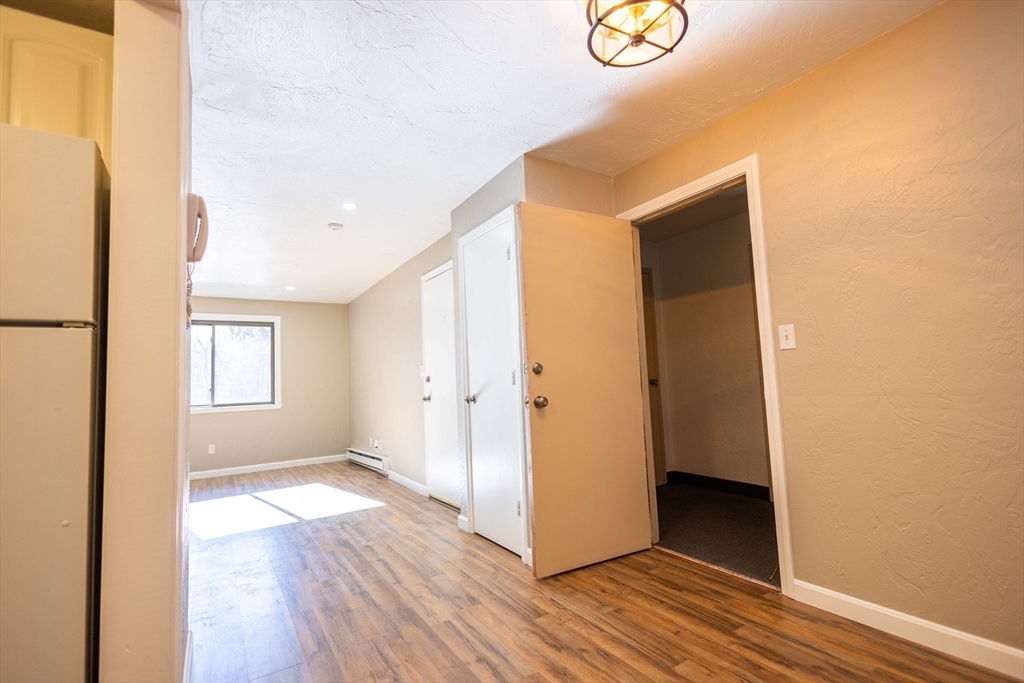 21 Erick Road, Unit 16 Mansfield, MA 02048 - Photo 18 of 28 a view of an entryway with wooden floor