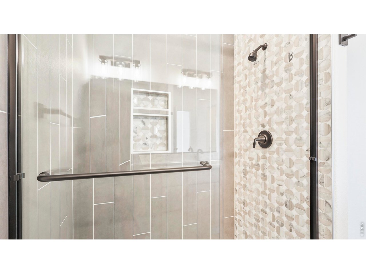 448 Cache Avenue Fort Morgan, CO 80701 - Photo 17 of 43 a bathroom with a shower and a sink